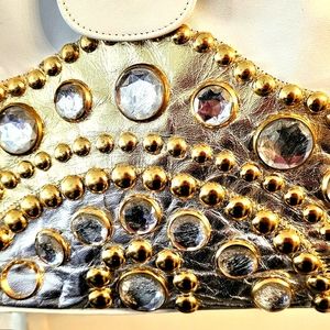 WHITE GENUINE LEATHER CLUTCH HANDBAG WITH GOLD & SILVER DESIGN ON FRONT..